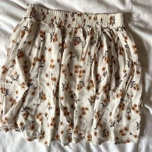 Brandy Melville Ivory Skirt with Sunflower Print